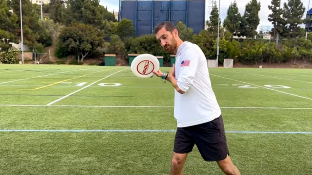 An ultimate player showing a forehand throw stance